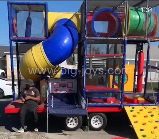 Movable playground with trailer